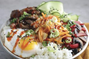 Featuring Haliburton Jasmine Rice, Fire Roasted Red Peppers, Fire Roasted Mushrooms, Gochujang Sauce and Kimchi-Style Cabbage