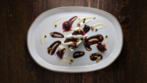 Featuring Haliburton Vanilla Bean Crème Anglaise, Hazelnut Chocolate Sauce and Mixed Berry Compote