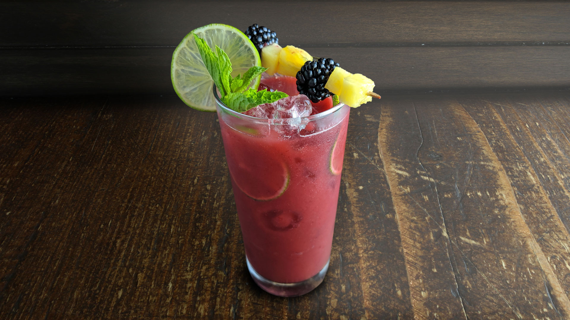 ROASTED PINEAPPLE BLACKBERRY COCKTAIL Featuring Haliburton’s ready-to-use roasted pineapple and blackberry mixer and pickled pineapple garish.
