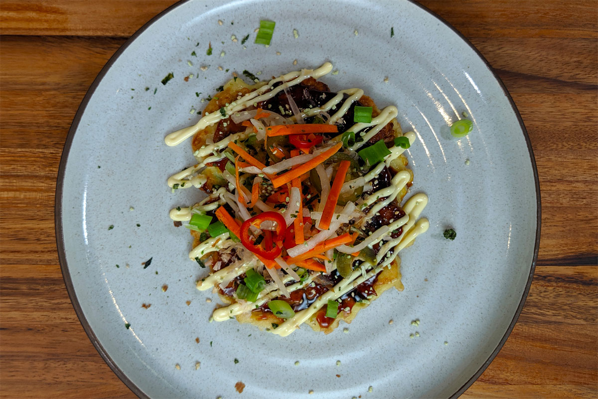 Japanese-Style Mayo, Okonomi Sauce, Pickled Banh Mi Vegetables, Citrus Pickled Red Jalapeños.